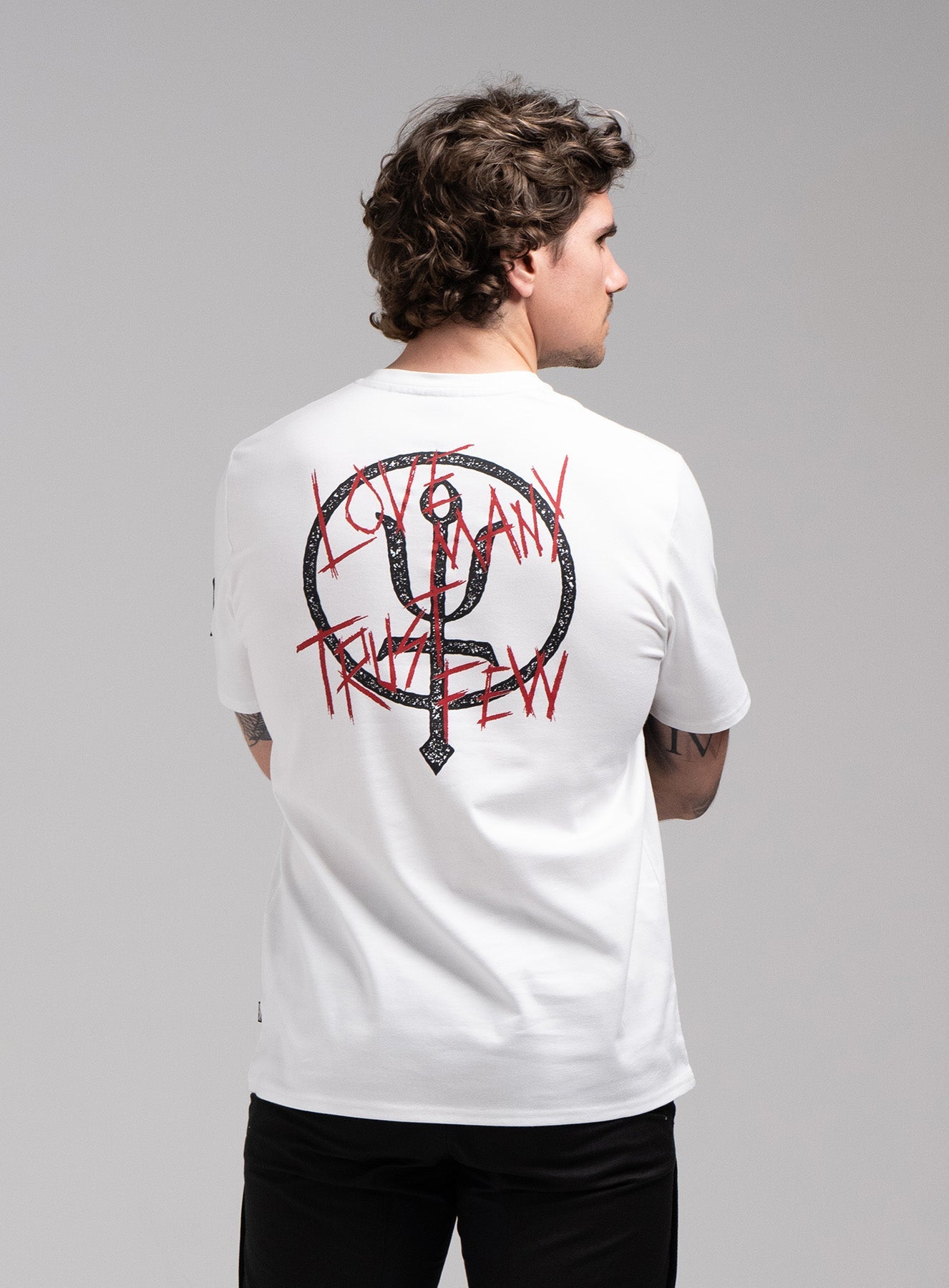 INSIGNIA T-SHIRT - LOVE MANY TRUST FEW